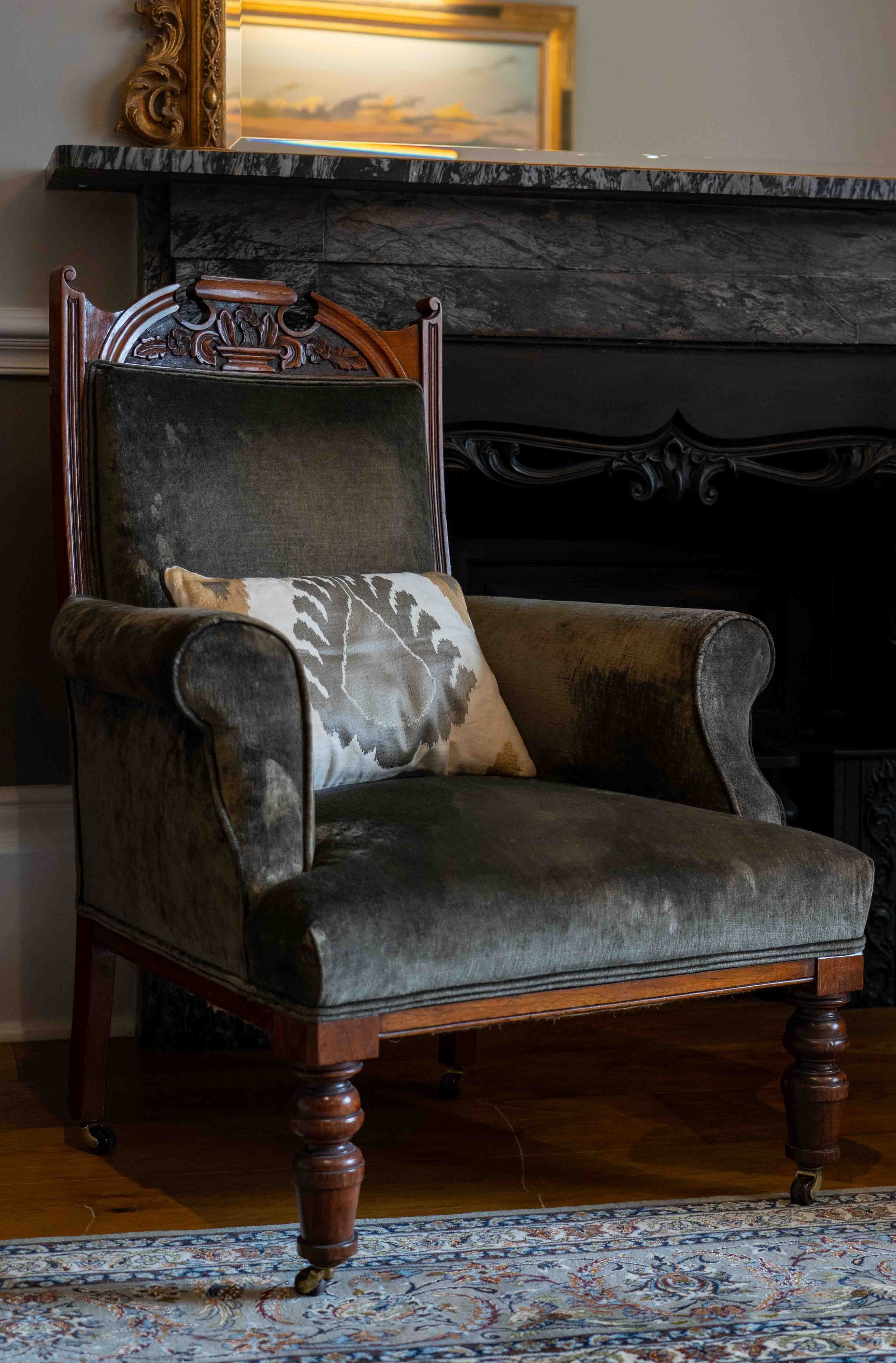 A pair of late Victorian upholstered walnut armchairs, width 73cm, depth 68cm, height 98cm. Condition - fair